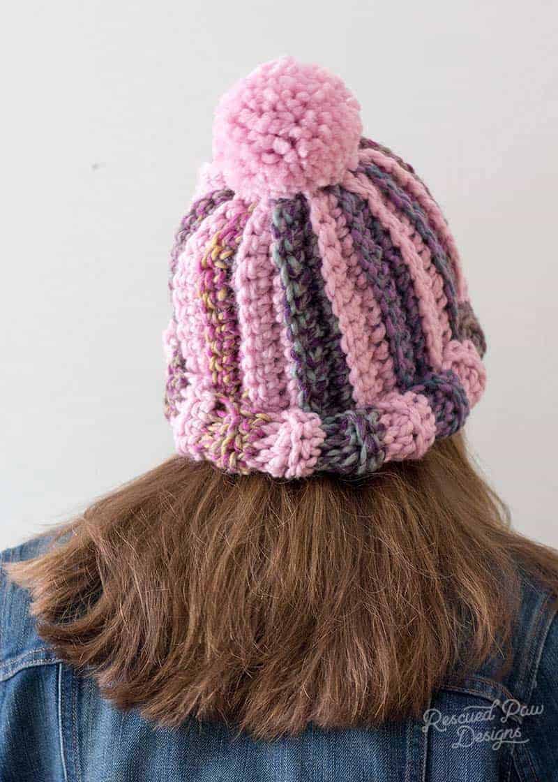 Back view of a pink striped crochet hat