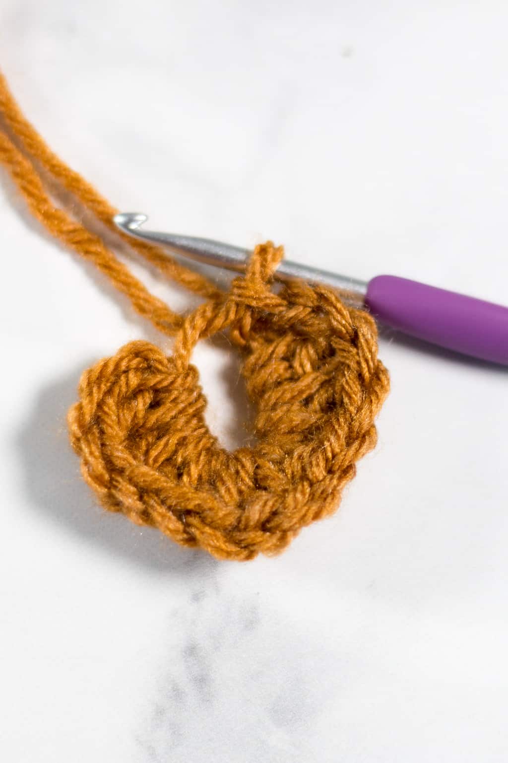 Closing a Crochet Heart with a Magic Circe