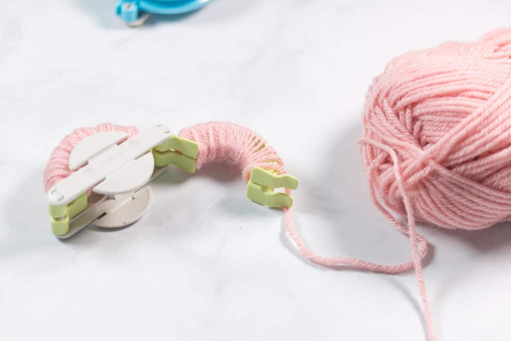 How to wrap yarn on a Clover Pom Pom Maker